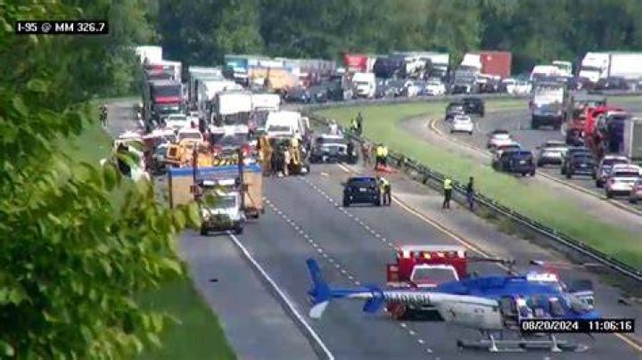 Ambulance narrowly avoids rollover crash on I-95: Video
