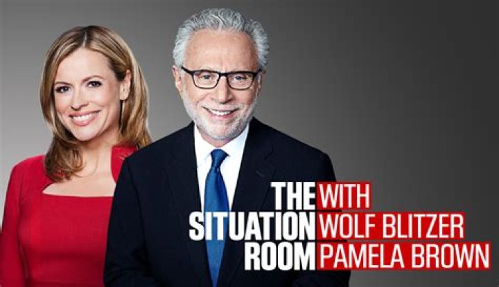 CNN cuts to commercial as Wolf Blitzer looks like he's about to vomit