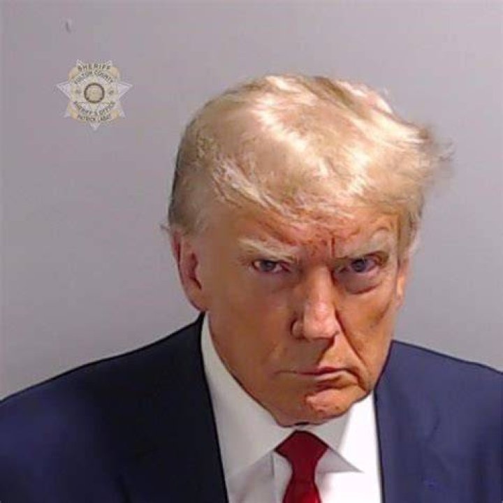 Donald Trump shares mugshot after turning himself into Georgia jail
