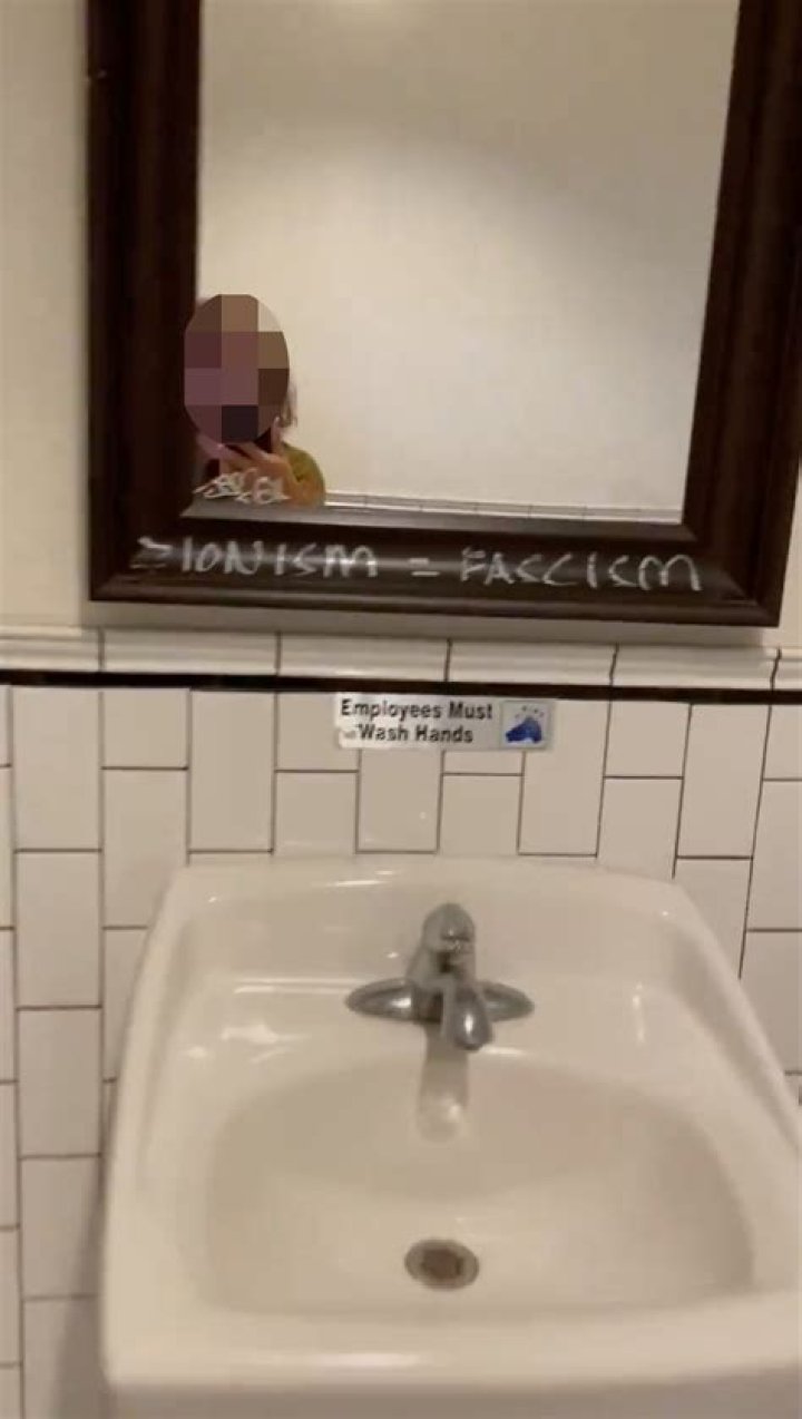 Jewish woman kicked out of cafe where staff back antisemitic graffiti
