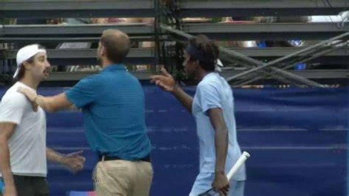 Tennis umpire holds back Jordan Thompson